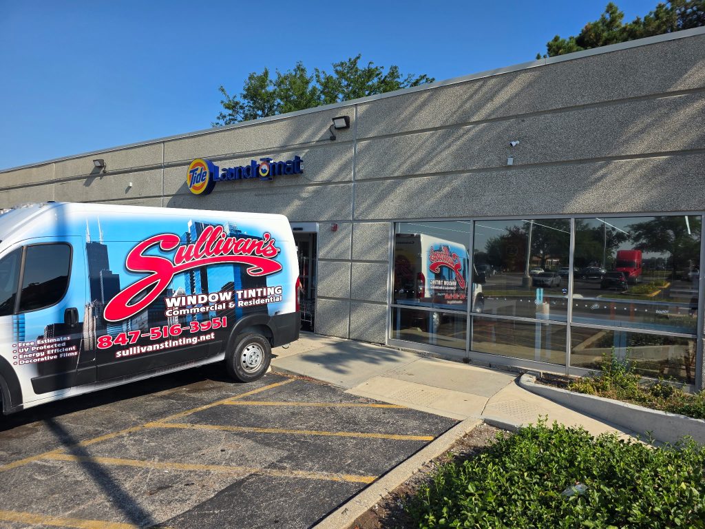 Anti-graffiti window film installation protecting Chicago commercial properties from vandalism