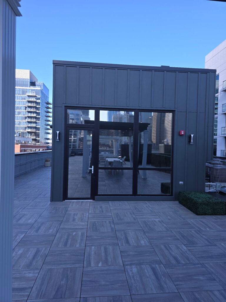 Privacy window film installation on Chicagoland office windows reducing energy costs year-round