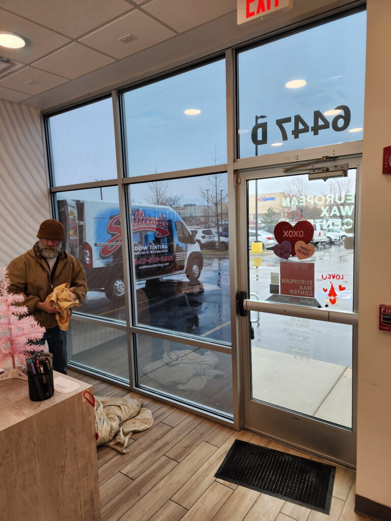 Storefront window film installation for a commercial property in Chicago by Sullivan's Window Tinting