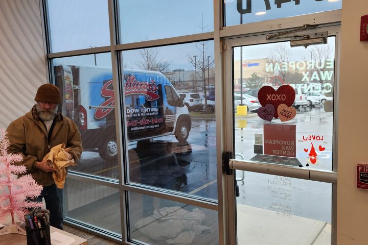Storefront window film installation for a commercial property in Chicago by Sullivan's Window Tinting